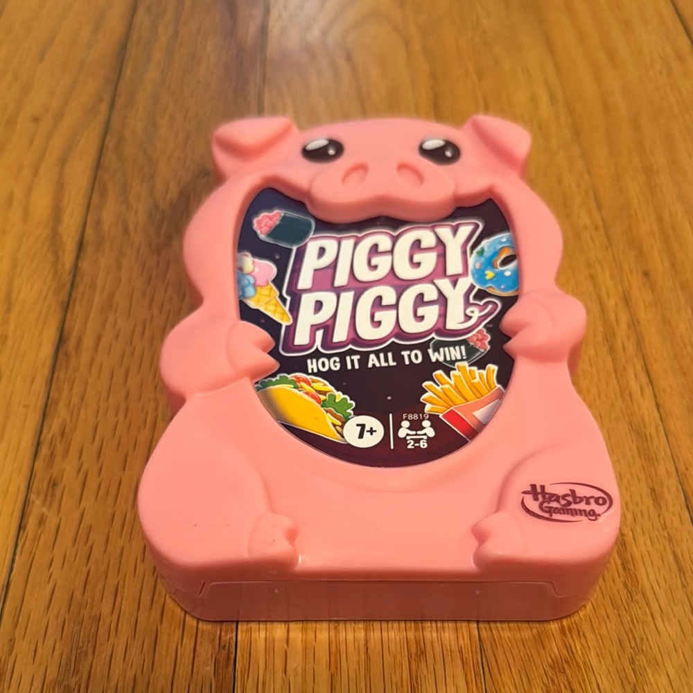 Piggy Piggy game by Hasbro Gaming Ages 7+